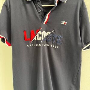 Lacoste Men's Polo Shirt with Red, Blue, and White Accents